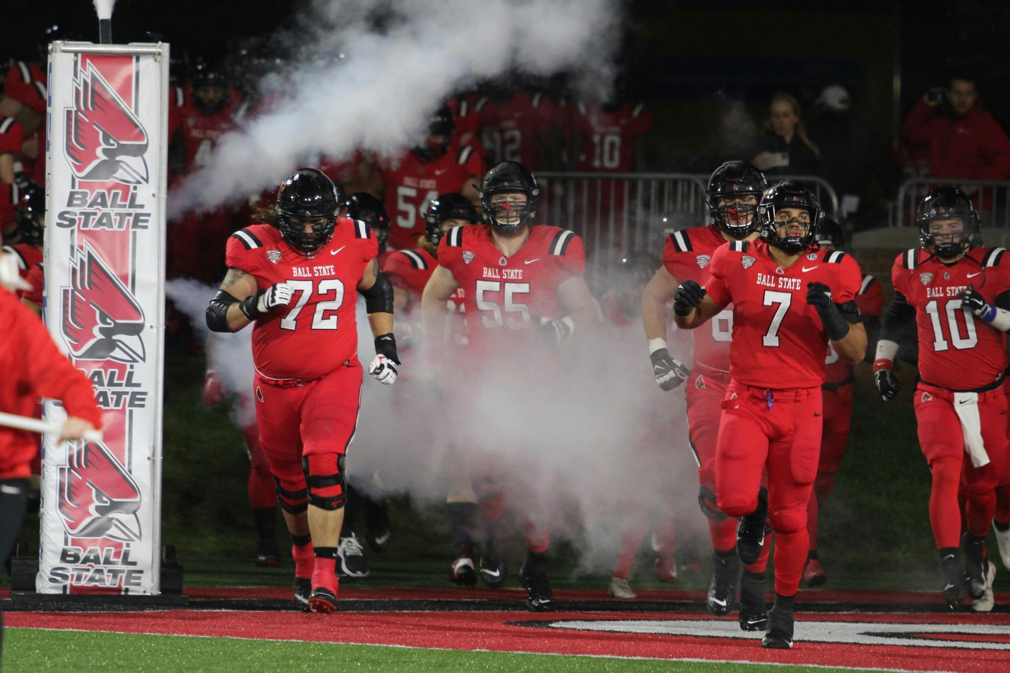 The Ball State football team runs out onto the field before the game against Central Michigan on Nov. 17, 2021, at Scheumann Stadium in Muncie, IN. Amber Pietz, DN