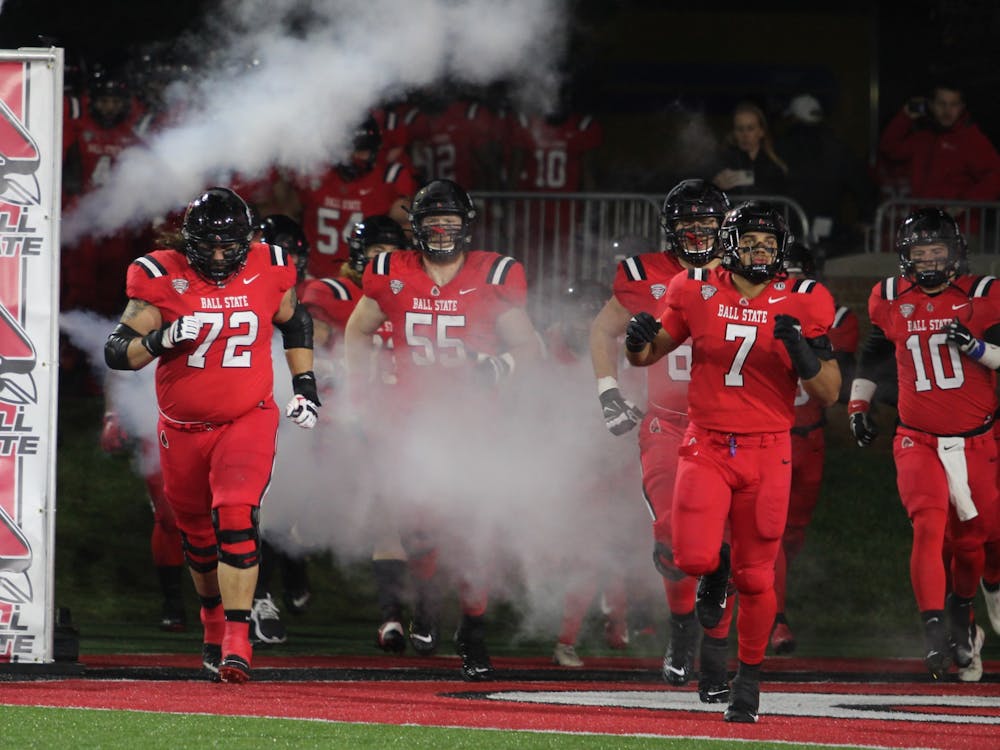 The Ball State football team runs out onto the field before the game against Central Michigan on Nov. 17, 2021, at Scheumann Stadium in Muncie, IN. Amber Pietz, DN
