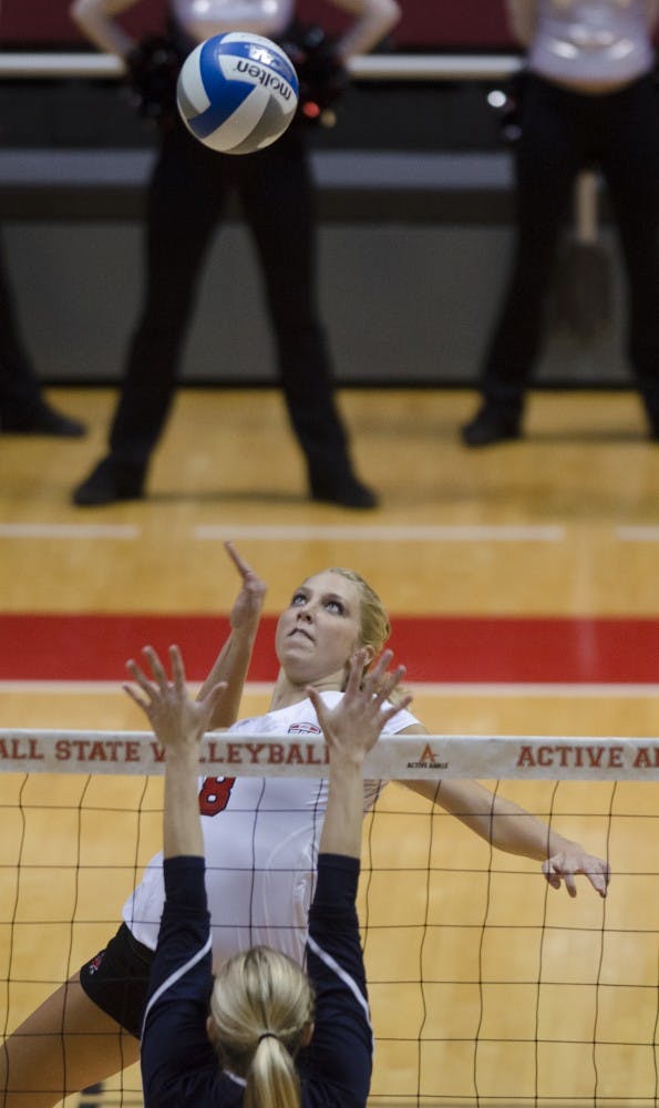 Mindy Marx, a senior middle hitter, goes up to hit the ball against the University of Toledo on Nov. 7 at Worthen Arena. Marx had 18 kills. DN PHOTO BREANNA DAUGHERTY 