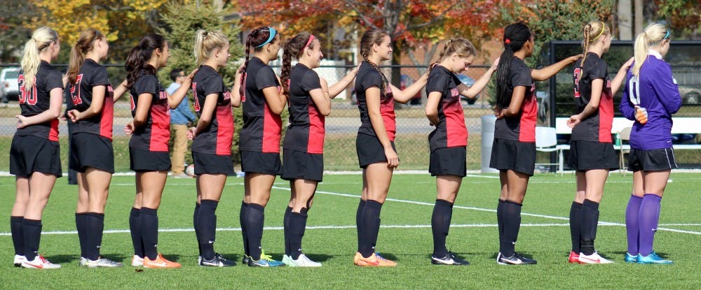 The Ball State Women's Soccer team lines up for the National Anthem before the match against Buffalo on Oct. 25 at the Briner Sports Complex. DN PHOTO ALLYE CLAYTON