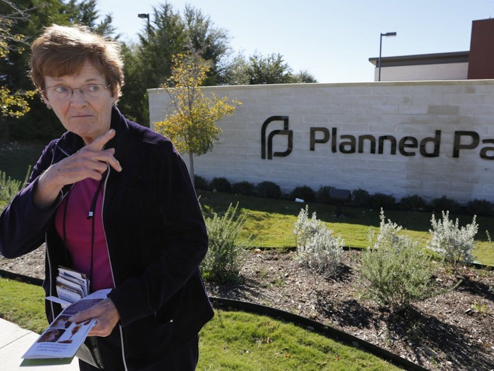 Marian Honquest, who is opposed to abortion, talks to a reporter in front of Planned Parenthood in Fort Worth, Texas, Friday, November 1, 2013. (David Kent/Fort Worth Star-Telegram/MCT)