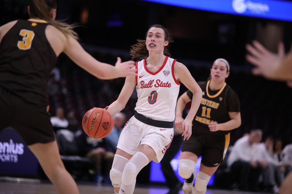 Senior Ally Becki dribbles down the court in the MAC Tournament against Western Michigan. Ball State advanced to the semifinals after beating Western Michigan 82-53. Rocket Arena, Cleveland, Ohio.