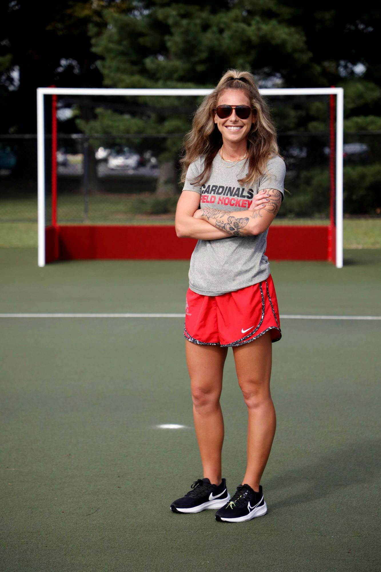 Ball State Field Hockey Head Coach Caitlin Walsh poses for a photo near a goal Sept. 3 at Briner Sports Complex. Walsh spent three years as an assistant coach at Kent State. Amber Pietz, DN