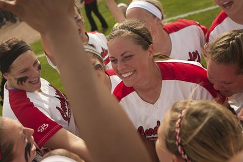 Members of the softball team celebrate their victory over Buffalo on May 3, 2013. With this win Ball State became the MAC conference champions of 2013. DN PHOTO JORDAN HUFFER