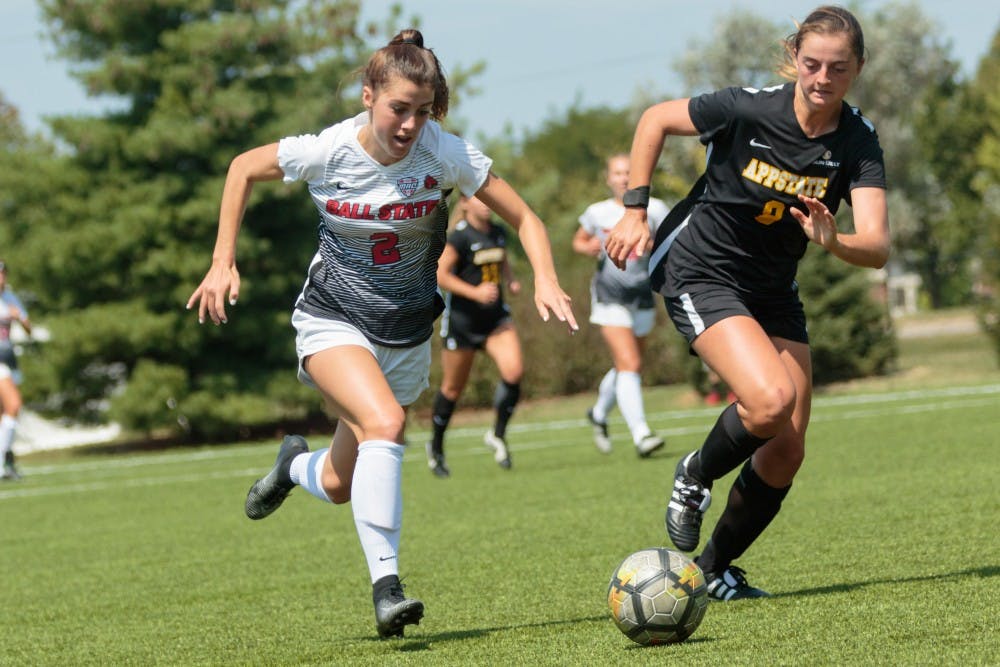 <p>Junior midfielder Lauren Roll dashes for the ball during the game against Appalachian State at the Briner Sports Complex on Aug. 27. They travel to Oxford, Ohio to take on Boston University (2-0) and University of Massachusetts-Lowell (1-1) in the Miami Invitational. Kyle Crawford, DN File</p>
