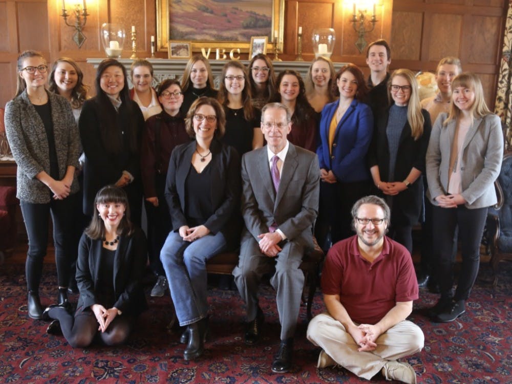 Honors students of the semester's Virginia Ball Center for Creative Inquiry course pose with Ball State President Geoffrey Mearns in the Kitselman Center. The course is working to develop and research materials for Beneficence Family Scholars whose goal is to end generational poverty. Liz Rieth, Photo Provided