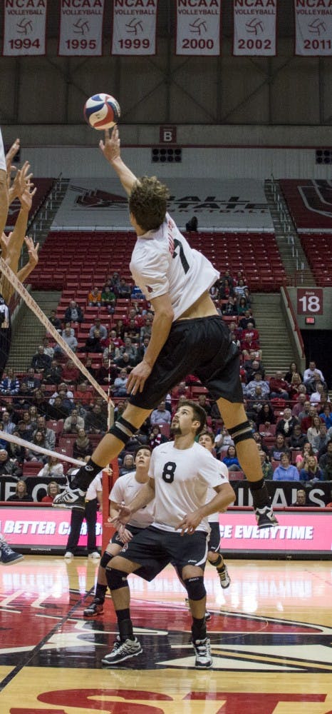 Senior Shane Witmer hits the ball over the net during the game against Penn State on Jan. 16 at Worthen Arena. DN PHOTO ALAINA JAYE HALSEY