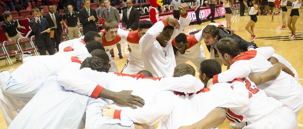 The Ball State men's basketball team forms a circle while senior guard Kindon Crowder dances in the middle before the game against Southeastern Missouri on Nov. 18 at Worthen Arena. Ball State won 87-83. DN PHOTO BREANNA DAUGHERTY 