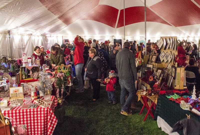 The Holiday Muncie Makers Market housed booths for approximately 50 artists for the annual Light Up DWNTWN on Dec. 1. The event joined the city's First Thursday art gallery opening and featured ice carving demonstrations, a Kiddie Express train and more. Grace Ramey // DN