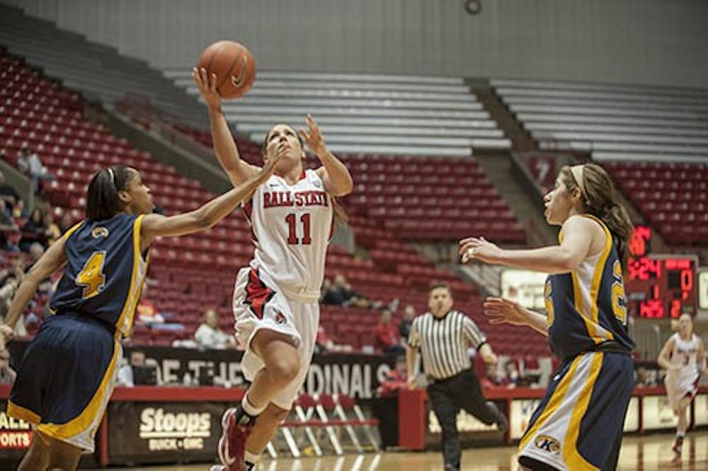Junior guard Brandy Woody drives toward the paint to attempt a layup against Kent State on Jan. 19. Woody was the lead scorer in the game against Buffalo. DN PHOTO CALEB CALLOWAY
