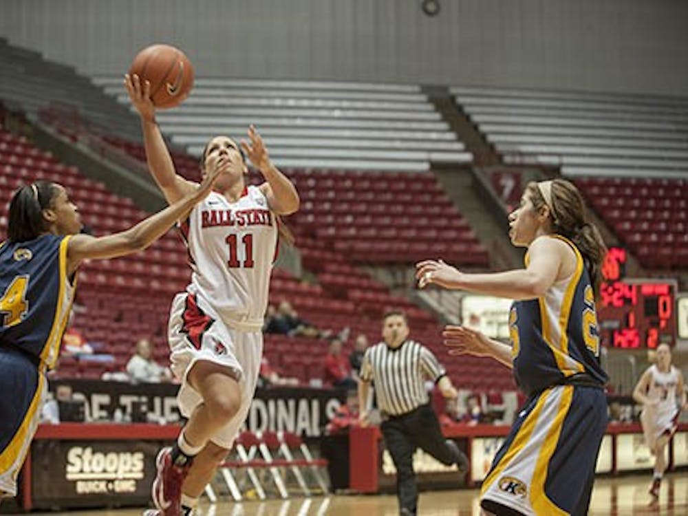 Junior guard Brandy Woody drives toward the paint to attempt a layup against Kent State on Jan. 19. Woody was the lead scorer in the game against Buffalo. DN PHOTO CALEB CALLOWAY