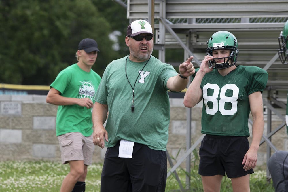 Yorktown head coach Mike Wilhelm points July 12 at a practice at Yorktown High School. Zach Carter, DN.