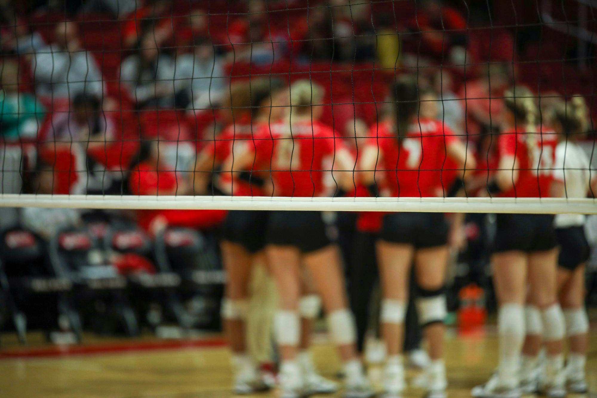 The Ball State women’s volleyball team is huddles together after receiving a kill in the second set from their opponent Eastern Michigan on Sep. 30 at Worthen Arena in Muncie, Indiana. Eve Green, DN
