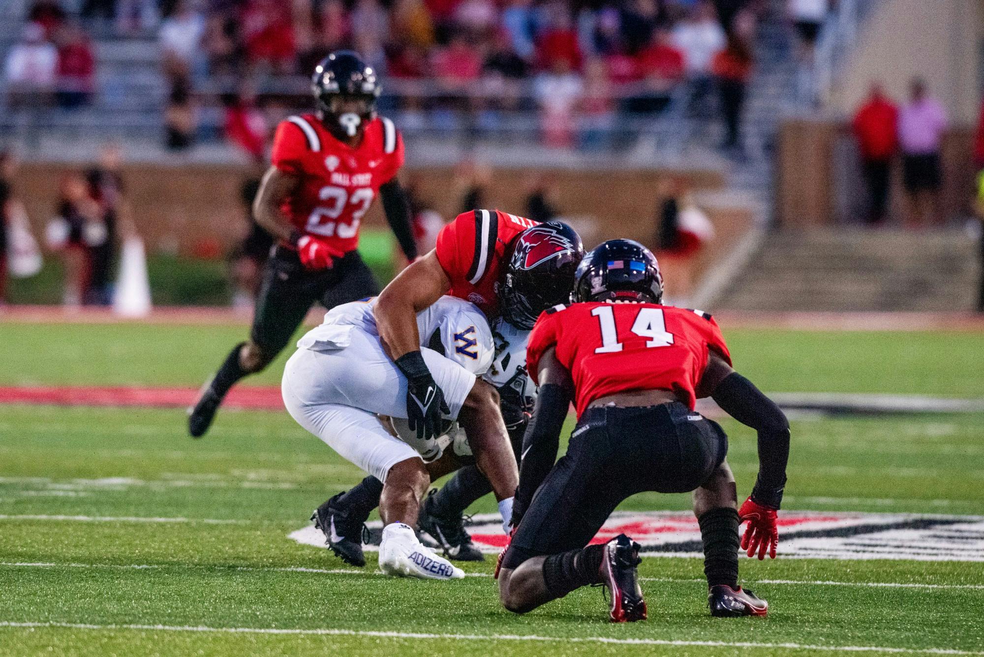 Ball State University outside linebacker, Brandon Martin, tackles Western Illinois wide receiver, Dallas Daniels, in the third quarter in a game on September 2nd, 2021 at Scheumann Stadium. Kyle Atkisson, DN