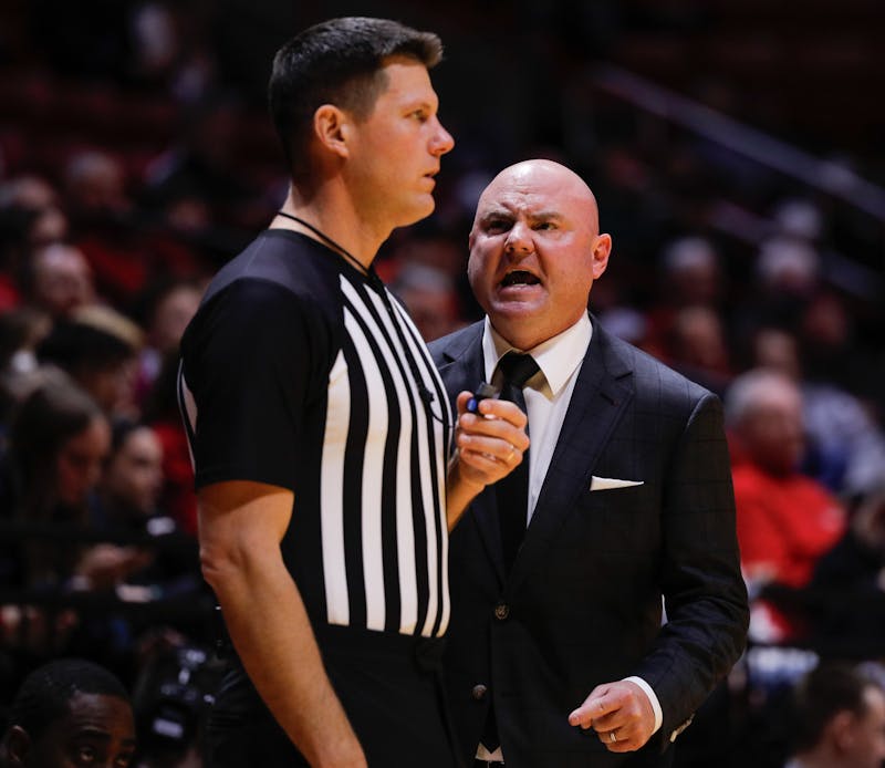 Ball State head coach Michael Lewis yells at the referee because of a call against Miami Jan. 1 at Worthen Arena. Ball State lost to Miami 80-72. Andrew Berger, DN