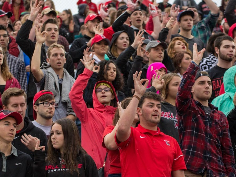 Ball State students cheer on the Cardinals during the game against Northern Illinois on Oct. 1 in Scheumann Stadium. Ball State lost 31-24. Grace Ramey // DN