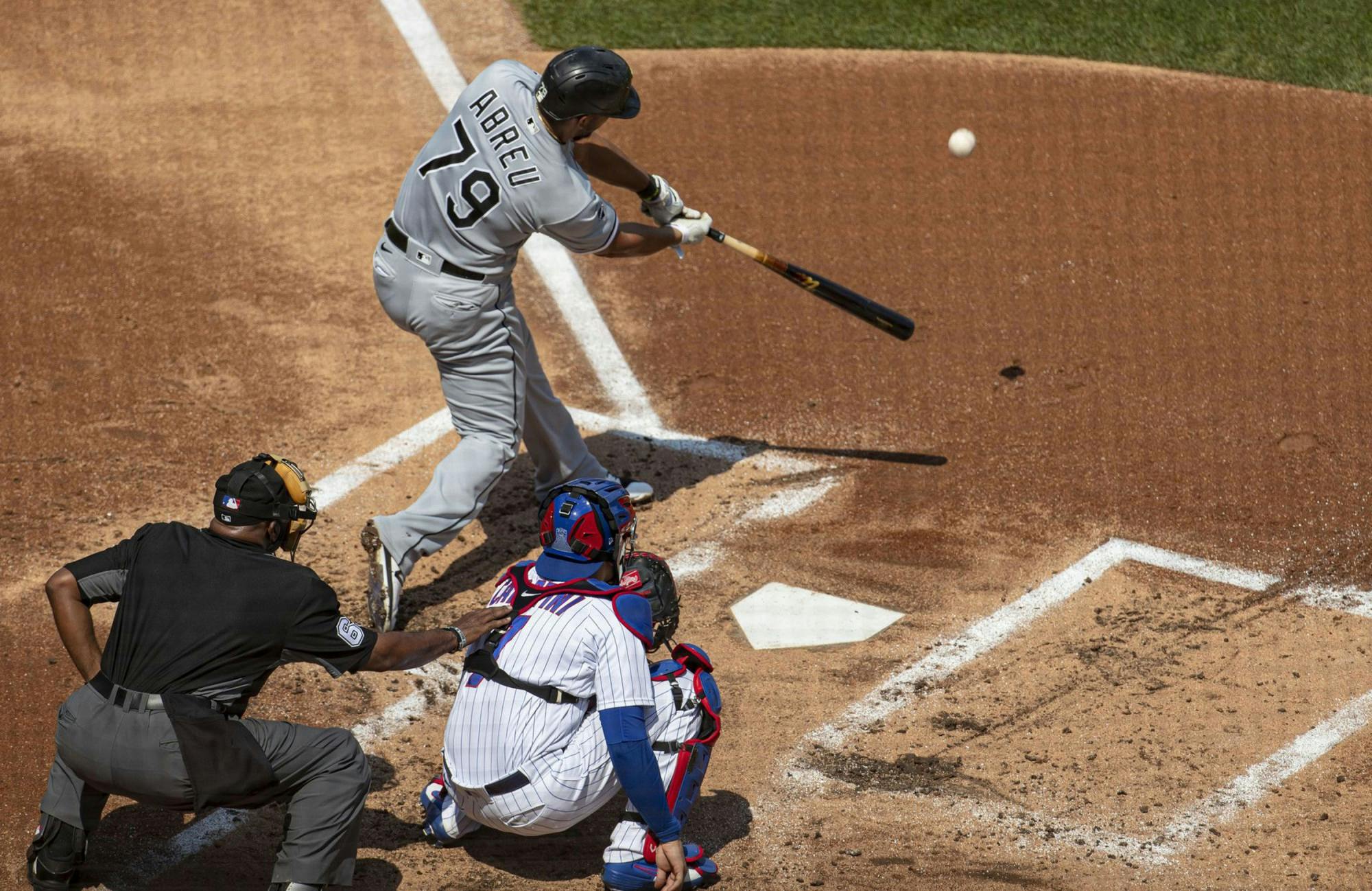 Jose Abreu of the Chicago White Sox connects on a home run off Chicago Cubs starting pitcher Yu Darvish in the second inning on Sunday, August 23, 2020, at Wrigley Field in Chicago. TNS, Photo Courtesy