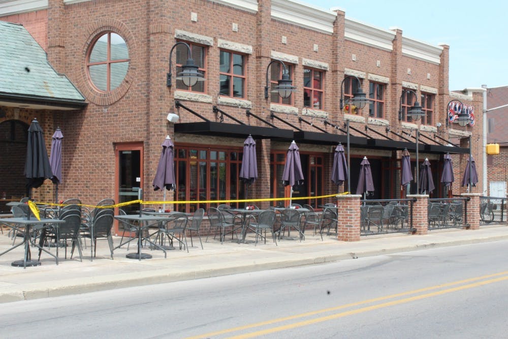 <p>An intoxicated driver hit the patio fence of Scotty's Brewhouse in The Village Wednesday, May 9. Officers were dispatched to the scene around 1 a.m. &nbsp;<strong>Brooke Kemp, DN Photo&nbsp;</strong></p>