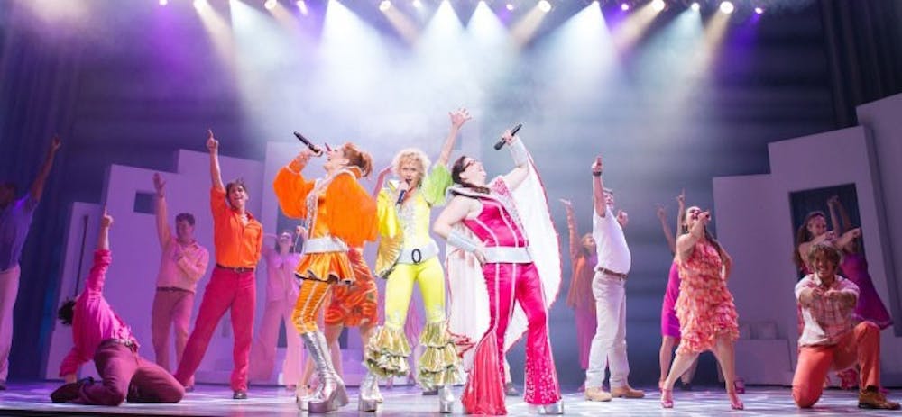 	<p>On Thursday night, the three lead women of the show sported shiny bell-bottoms and matching tops. Just seconds later, the three main men of the show came out matching their counterparts.</p>