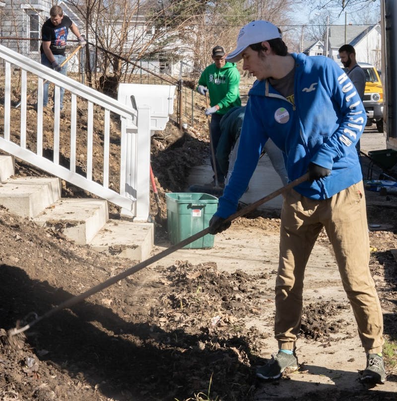 A volunteer plows dirt at a Habitat for Humanity house Mar. 23, 2019 during the CCIM Community day. Volunteers had the opportunity to help out in a morning shift, afternoon shift or both.  Scott Fleener, DN