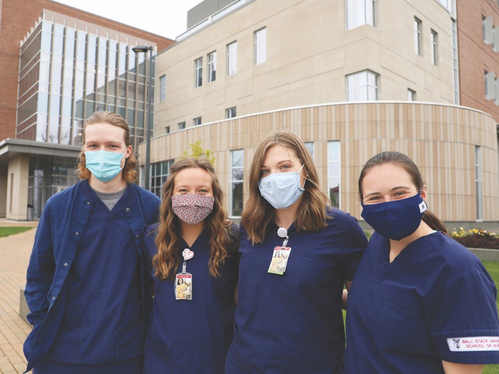 (from left to right) Senior nursing majors Gabriel Cochard, Lauren Hamil, Emily Bastian and Kaitlyn Hansen pose for a photo outside of the Health Professions Building. The building opened in 2019 and houses the university&#x27;s College of Health. Rylan Capper, DN