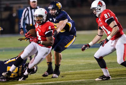 DN PHOTO COREY OHLENKAMP Ball State running back Horactio Banks makes a run for Ball State. Ball State would take the game against Toledo 34-27.