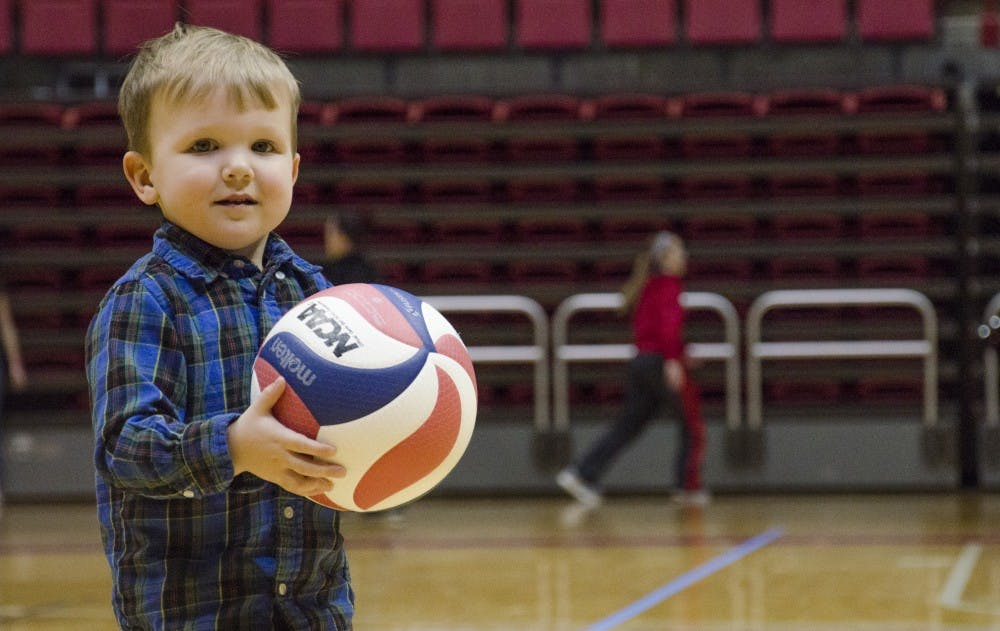 Luke Herlyn, 2, plays volleyball at the Winter Fan Jam on Jan. 4 at Worthen Arena. DN PHOTO BREANNA DAUGHERTY