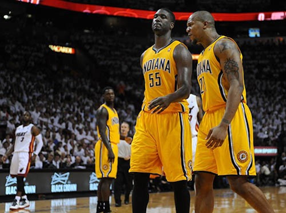 Roy Hibbert and David West of the Indiana Pacers react during Game 7 of the NBA Conference Finals. The Pacers will have the 23rd and 53rd picks in the draft, and are hoping to make a better team that will take them further in the playoffs. MCT PHOTO