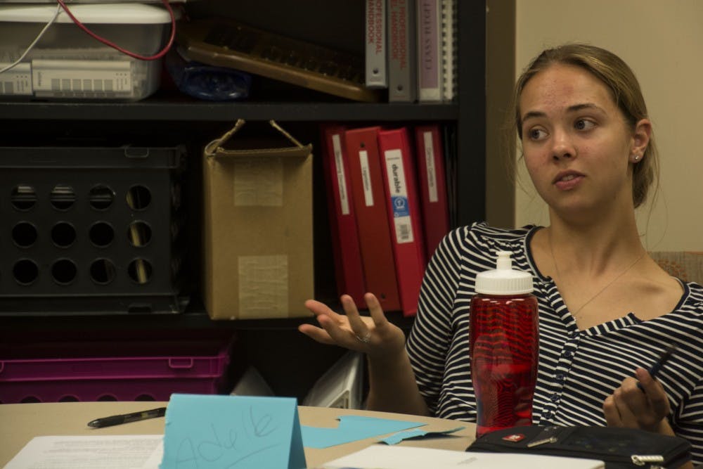 Freshman English Literature major, Adelle Shrader, asks questions at the Freshmen 115 workshop hosted by the Student Government Association. New students had the option of taking the workshop to learn more about what Ball State has to offer and get more connected with campus. DN PHOTO SAMANTHA BRAMMER