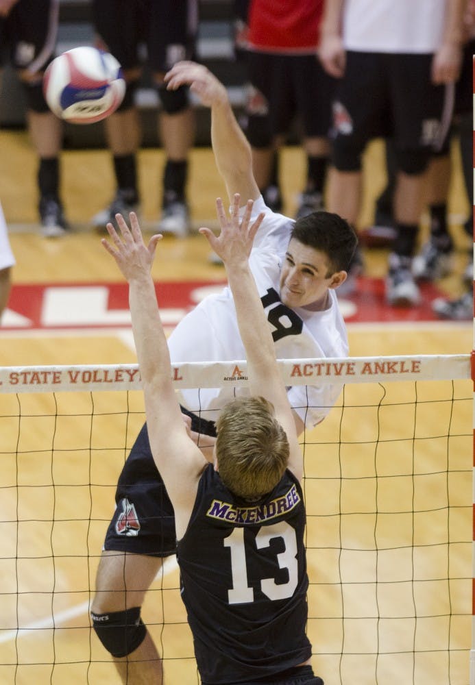 Freshman outside attacker Mike Scannell knocks the ball over the net from the corner against McKendree Jan. 24 at Worthen Arena. DN PHOTO BREANNA DAUGHERTY