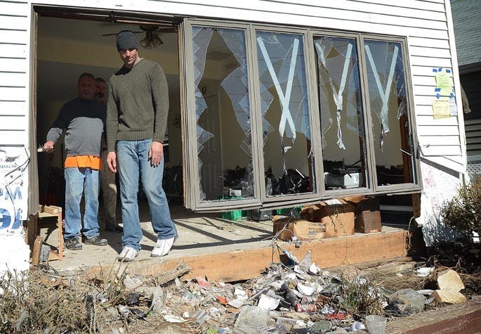 Chris Brady surveys the damage of his destroyed home Sunday, November 4, 2012, in Lindenhurst, New York in the aftermath of Superstorm Sandy. (Thomas A. Ferrara/Newsday/MCT)