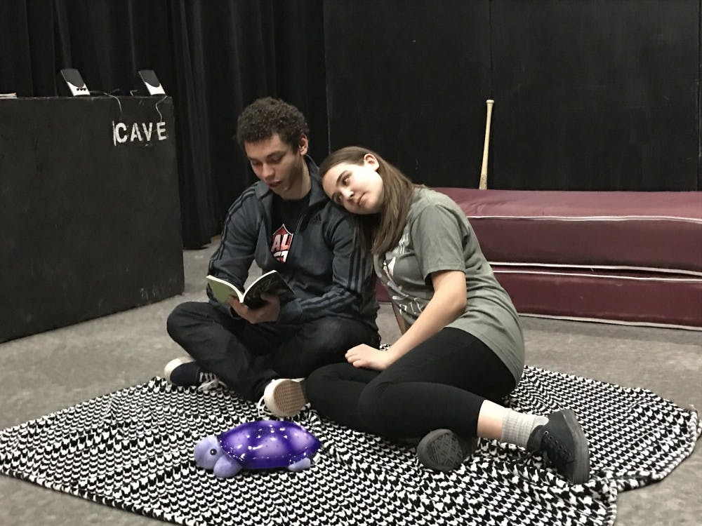 <p>Caroline, played by junior acting major Abbi Minessale, leans on Anthony,&nbsp;played by sophomore acting major Tyler Rainer, as he reads&nbsp;Walt Whitman to her&nbsp;in Cave Theatre's newest show, "I and You."&nbsp;The show, which will run from Feb. 16-25, tells the story of a girl with a liver transplant who works on a literature project with her classmate while she's stuck at home.&nbsp;<em>Alexandra Smith // DN</em></p>