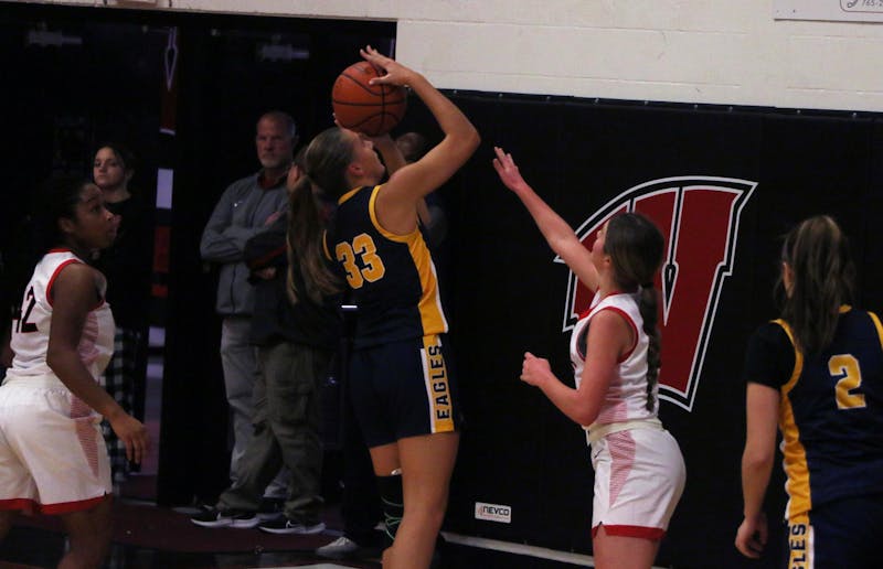 Delta sophomore Jillian Bar shoots Nov. 17, 2023 in a game against Wapahani at Wapahani High School. Zach Carter, DN.