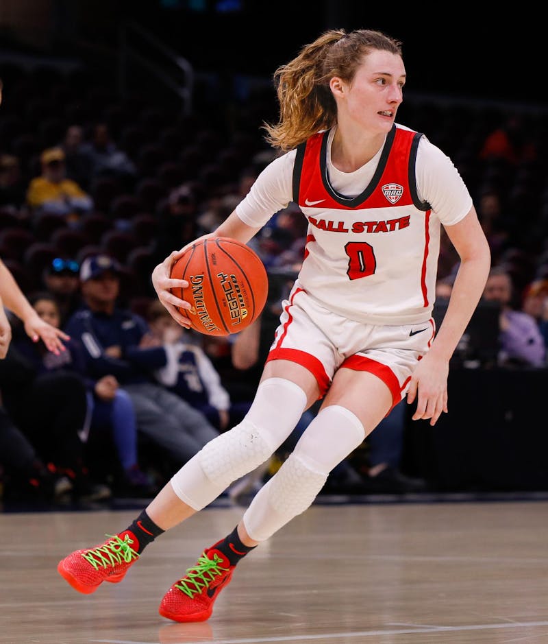 Junior Ally Becki turns with the ball after a steal on defense against Kent State March 15 at Rocket Mortgage Fieldhouse in Cleveland, Ohio.