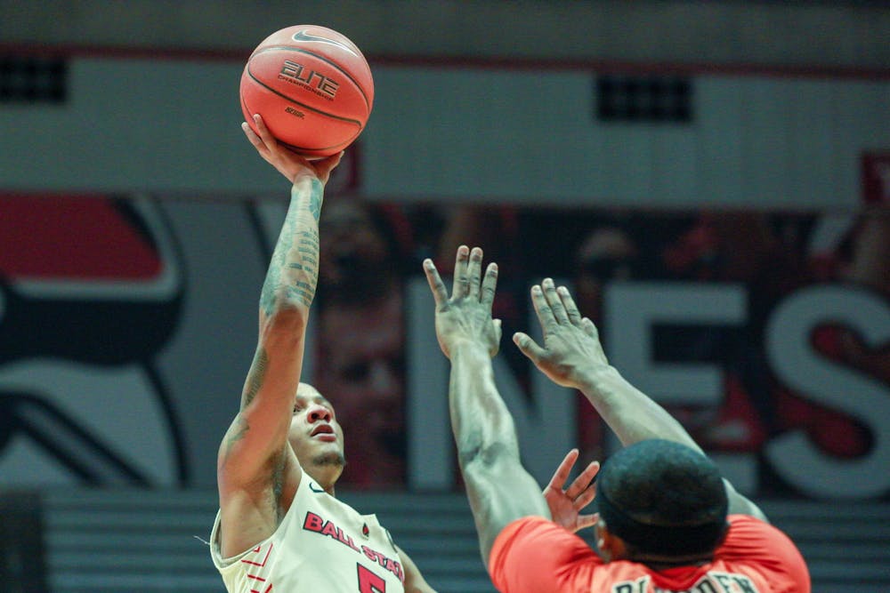 <p>Junior guard, Ishmael El-Amin (5), attempts a teardrop layup against Bowling Green, Feb. 15, 2020, at John E. Worthen Arena. The cardinals made a run at the end of the game but <strong>it wasn't enough as they fall to the Falcons 77-71. </strong>Omari Smith, DN</p>