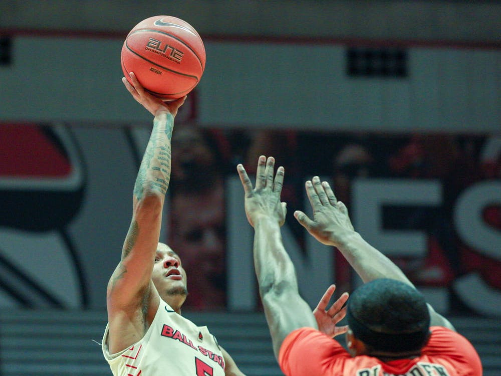 Junior guard, Ishmael El-Amin (5), attempts a teardrop layup against Bowling Green, Feb. 15, 2020, at John E. Worthen Arena. The cardinals made a run at the end of the game but it wasn't enough as they fall to the Falcons 77-71. Omari Smith, DN
