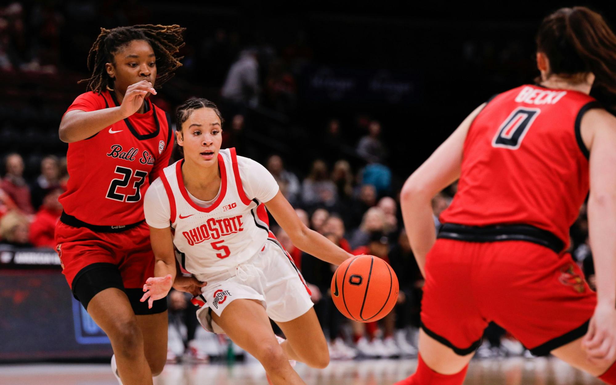 Ohio State freshman Ava Watson drives through Ball State defense Dec. 10 at The Schottenstein Center in Columbus, Oh. Watson had 15 points against the Cardinals. Andrew Berger, DN 
