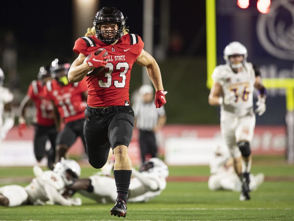 Cardinals freshman running back Carson Steele runs for his first collegiate touchdown against the Western Illinois Roughnecks Sept. 2, 2021, at Scheumann Stadium. The Cardinals beat Western Illinois in the home opener 31-21. Jacob Musselman, DN