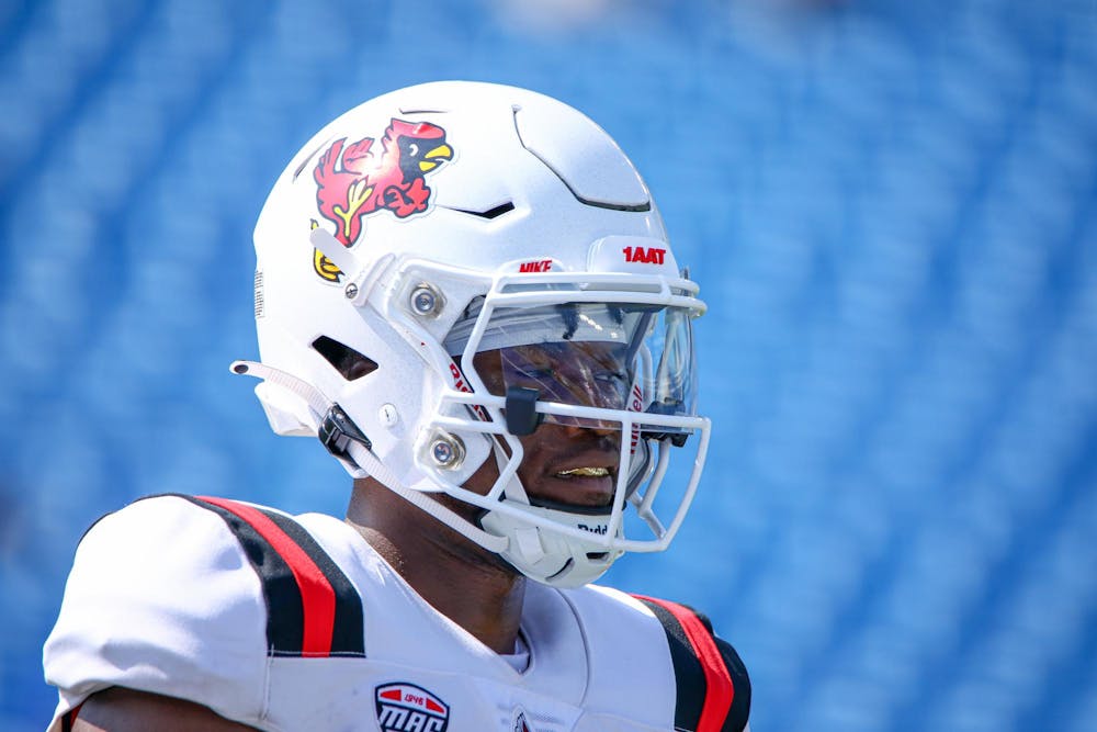 <p>Redshirt sophomore quarterback Kiael Kelly warming up before kickoff against Kentucky Sept. 2. Kelly rushed for 21 yards as the Cardinals utilized him for Run-Pass Option plays in the 44-14 loss. Daniel Kehn, DN</p>