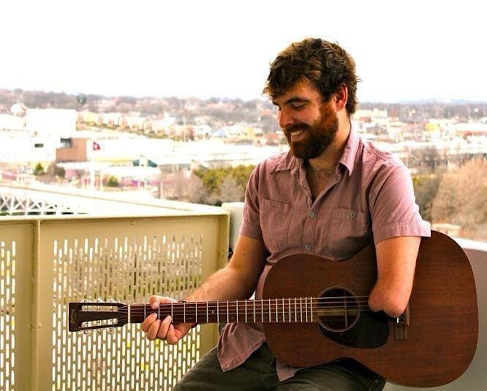 <p>Tony Memmel, a Nashville singer-songwriter, will be performing at Be Here Now on March 15, his first of three stops in Indiana. Memmel was born without a left forearm and hand, but learned to play despite his situation.&nbsp;<em>PHOTO PROVIDED BY TONYMEMMEL.COM</em></p>