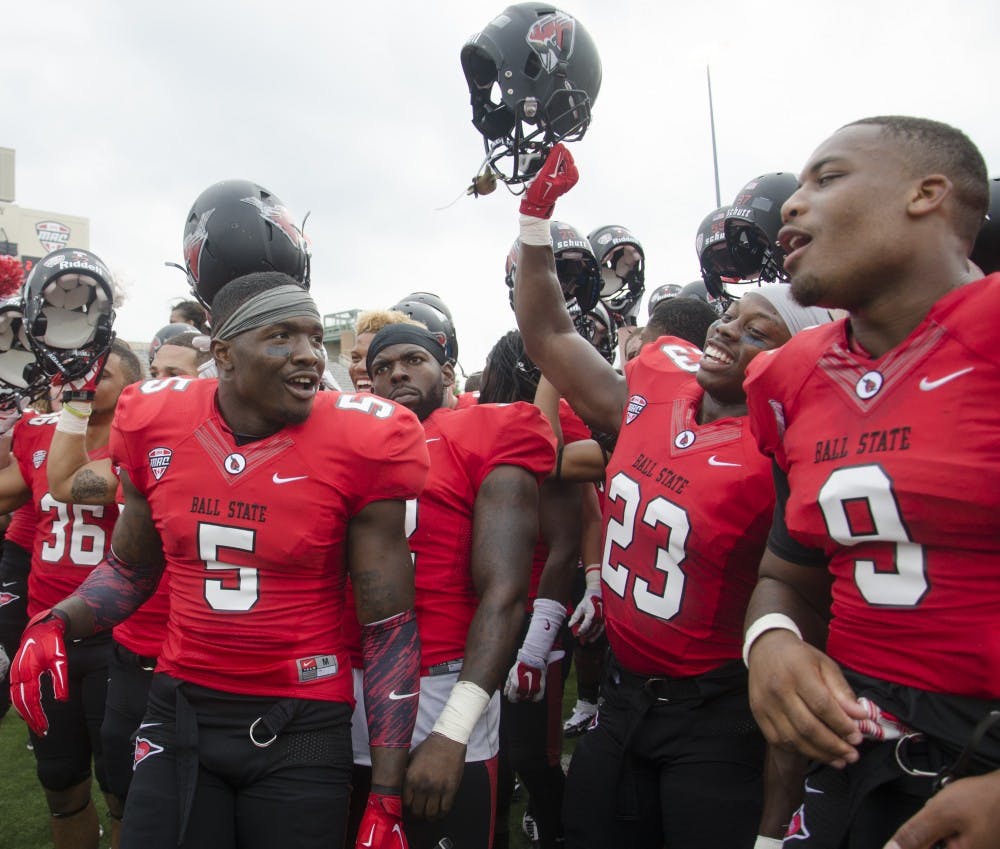The Ball State football team celebrates after winning 30-10 against Colgate on Aug. 30 at Scheumann Stadium. DN PHOTO BREANNA DAUGHERTY 