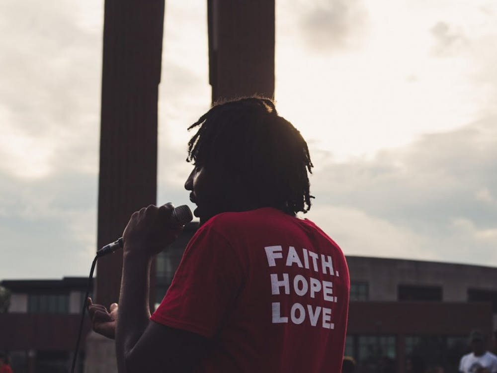 Rapper LJ performs near Shafer Bell Tower in Fall 2018. LJ premiered his music video for his song, "FHL," at The Sauna Feb. 21, 2019. Paul Novosel, Photo Provided.