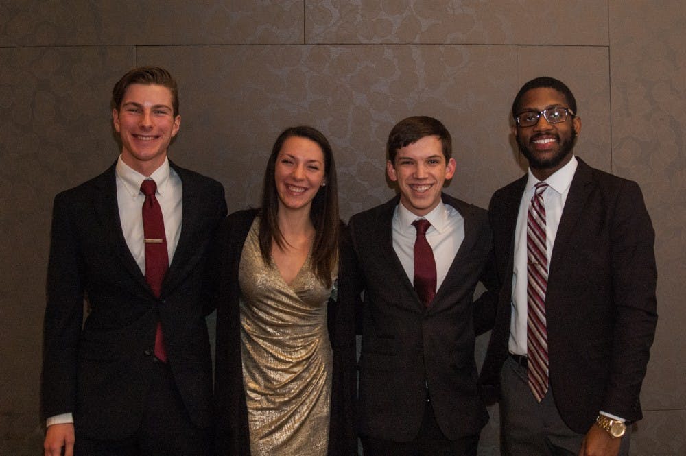 <p>&nbsp;Amplify's Matt Hinkleman, vice president, Kyleigh Snavely, Secretary, Isaac Mitchell, president, Jalen Jones, treasurer pose for a photo after being slated for the upcoming SGA elections on Feb. 12. <strong>Madeline Grosh, DN</strong></p>