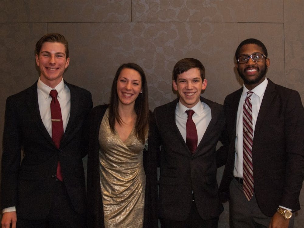 &nbsp;Amplify's Matt Hinkleman, vice president, Kyleigh Snavely, Secretary, Isaac Mitchell, president, Jalen Jones, treasurer pose for a photo after being slated for the upcoming SGA elections on Feb. 12. Madeline Grosh, DN