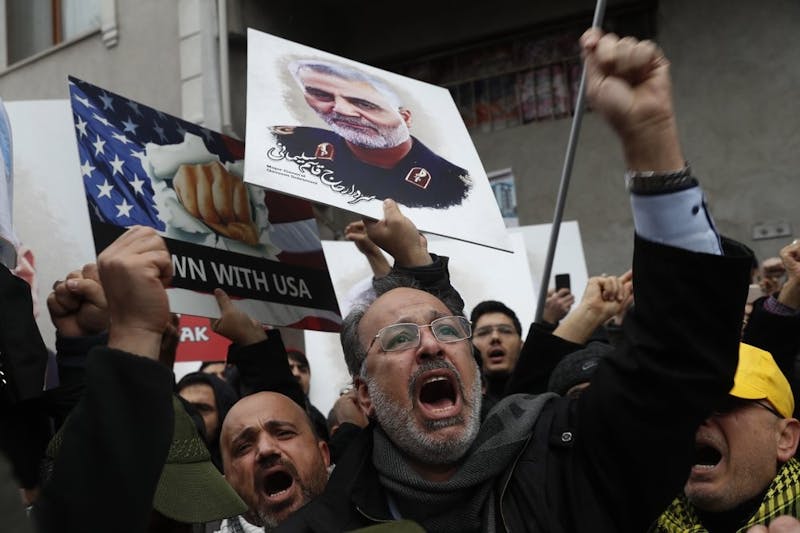 Protesters chant anti-U.S. slogans during a demonstration against the killing of Iranian Revolutionary Guard Gen. Qassem Soleimani, close to United States' consulate in Istanbul, Jan. 5, 2020. Iran has vowed "harsh retaliation" for the U.S. airstrike near Baghdad's airport that killed Soleimani, as tensions soar in the wake of the targeted killing. (AP Photo/Lefteris Pitarakis)