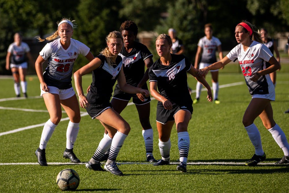 Ball state players, Jenna Dombrowski and Sam Kambol, fight off Omaha players for possession of the ball Friday, Sept. 14, 2018 at Briner Sports Complex. Ball State defeated Omaha 3 to 1 bringing the Cardinals overall record to 4-1-1. Eric Pritchett,DN