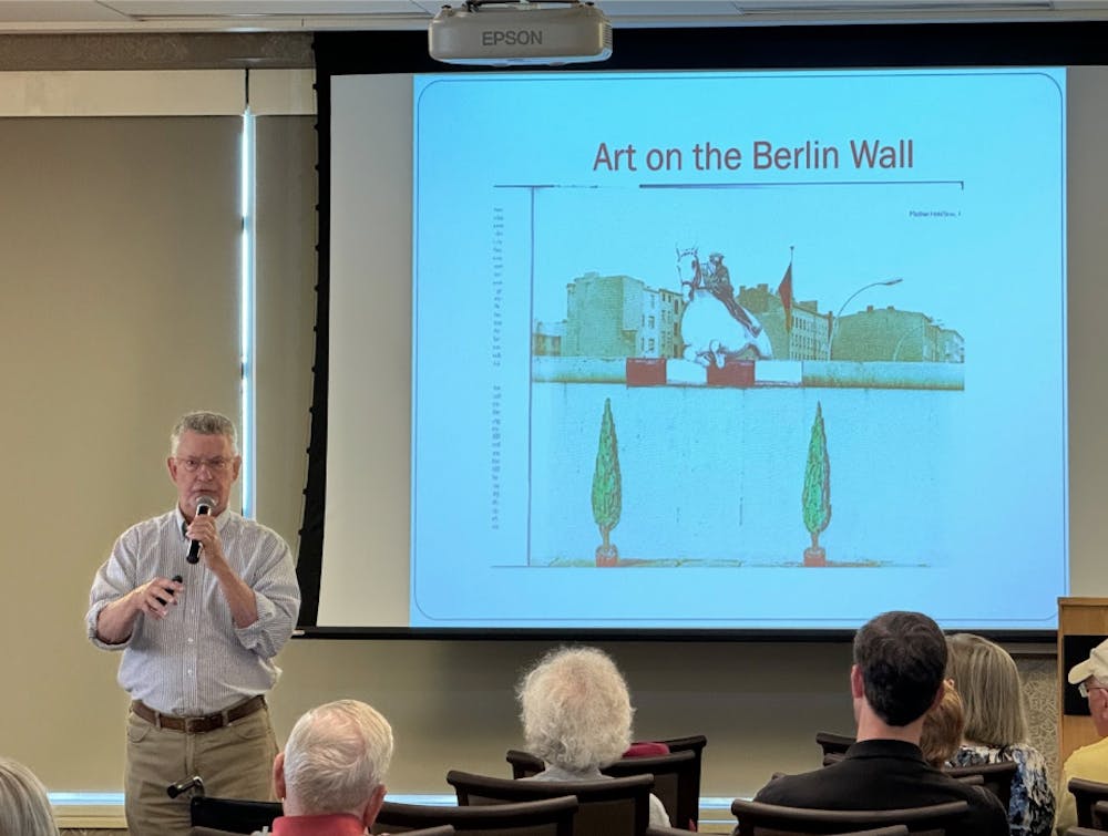 Retired high school teacher holds presentation about history of Berlin Wall