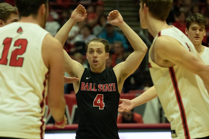 Senior libero Nick Lavanchy celebrates with his team after a win Jan. 10, 2020, in John E. Worthen Arena. Ball State beat Queens, 3-0. Jacob Musselman, DN