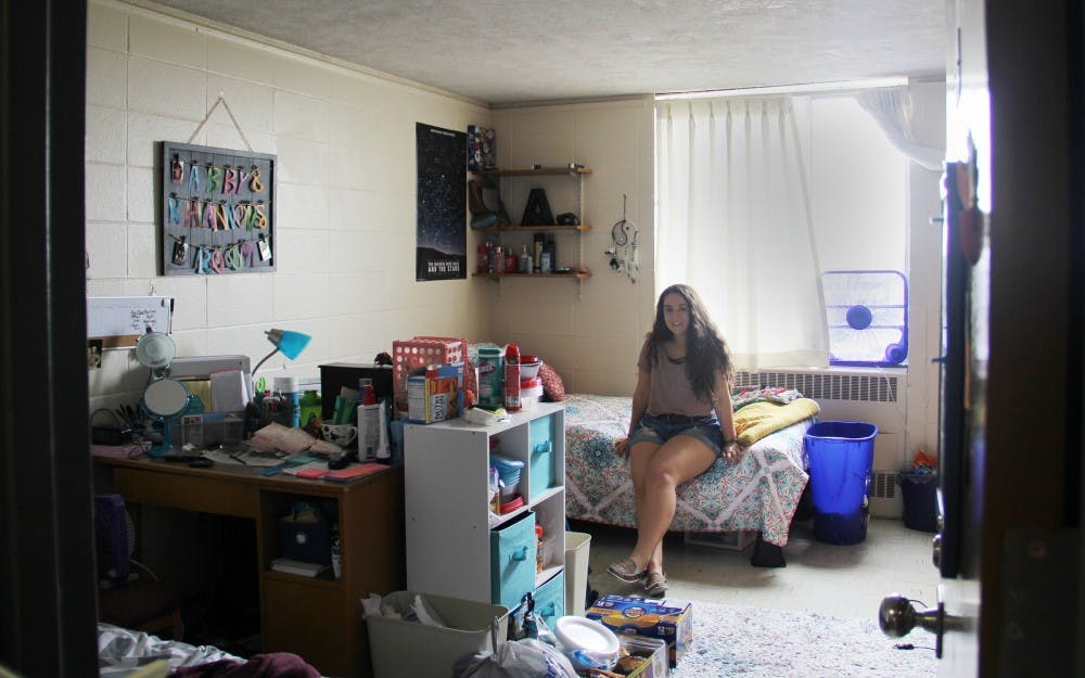 <p>Sophomore telecommunications and journalism major Abby LeClercq sits in her room in LaFollette Complex. LeClercq's room is approximately 150 square feet. Paige Grider, DN</p>