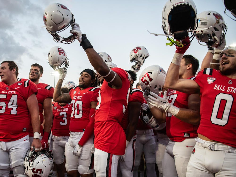 Ball State football sings its fight song to the crowd after defeating Central Michigan 24-17 Oct. 21 at Scheumann Stadium. The win marked the Cardinals' first Mid-American Conference victory of the season. Dalton Clark, DN